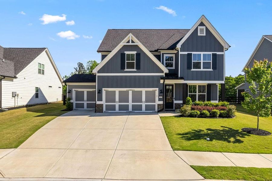 Front exterior of a new home in , Dallas, GA, highlighting curb appeal (Image 28).