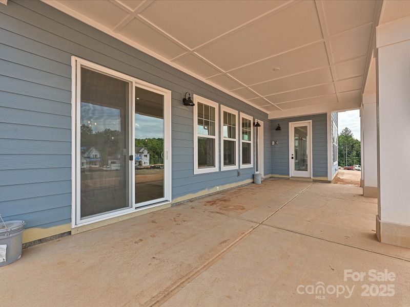 Front exterior of a new home in Coventry Glen, Huntersville, NC, highlighting curb appeal (Image 22). Front exterior of a new home in Coventry Glen, Huntersville, NC, highlighting curb appeal (Image 22).