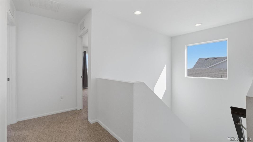 Upper Level Landing and stairs to the main level.