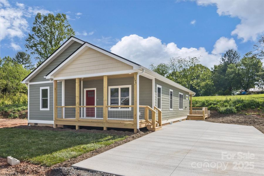 Front exterior of a new home in , Clyde, NC, highlighting curb appeal (Image 21). Front exterior of a new home in , Clyde, NC, highlighting curb appeal (Image 21).