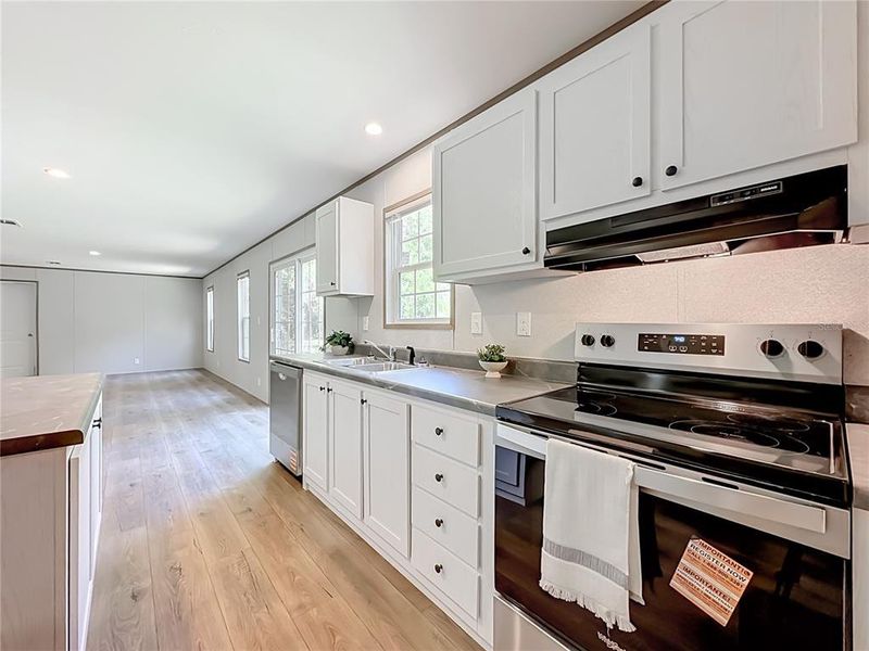 Furnished interior view inside a new home in , Satsuma (Image 27).
