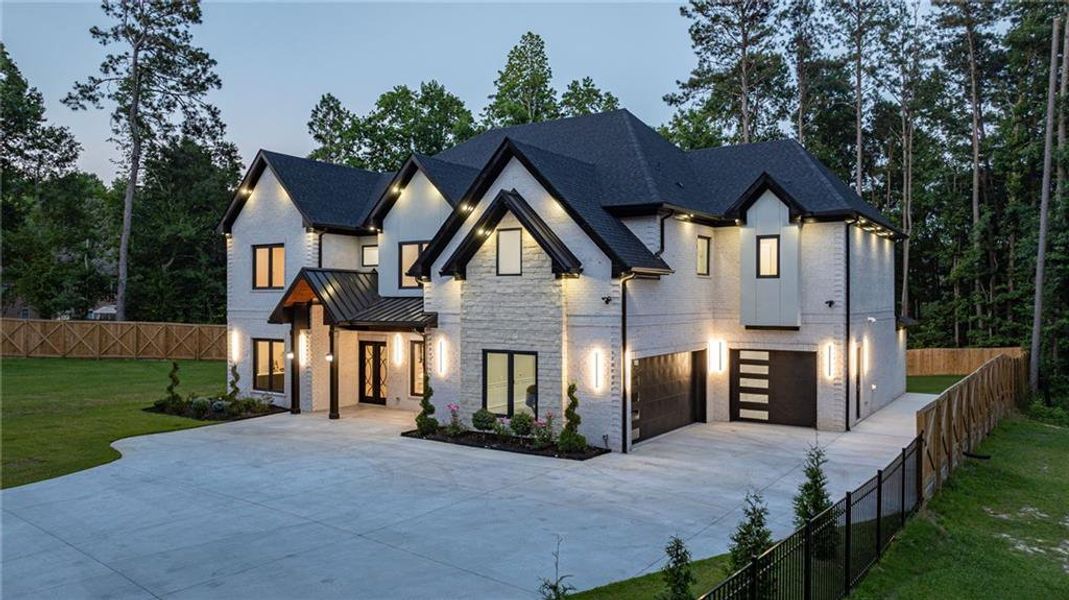 Front exterior of a new home in , Lawrenceville, GA, highlighting curb appeal (Image 35). Front exterior of a new home in , Lawrenceville, GA, highlighting curb appeal (Image 35).