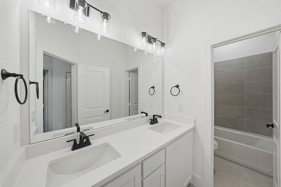 Furnished interior view inside a new home in Brookhollow West, Prosper (Image 14).