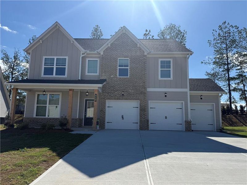 Front exterior of a new home in , Villa Rica, GA, highlighting curb appeal (Image 1). Front exterior of a new home in , Villa Rica, GA, highlighting curb appeal (Image 1).