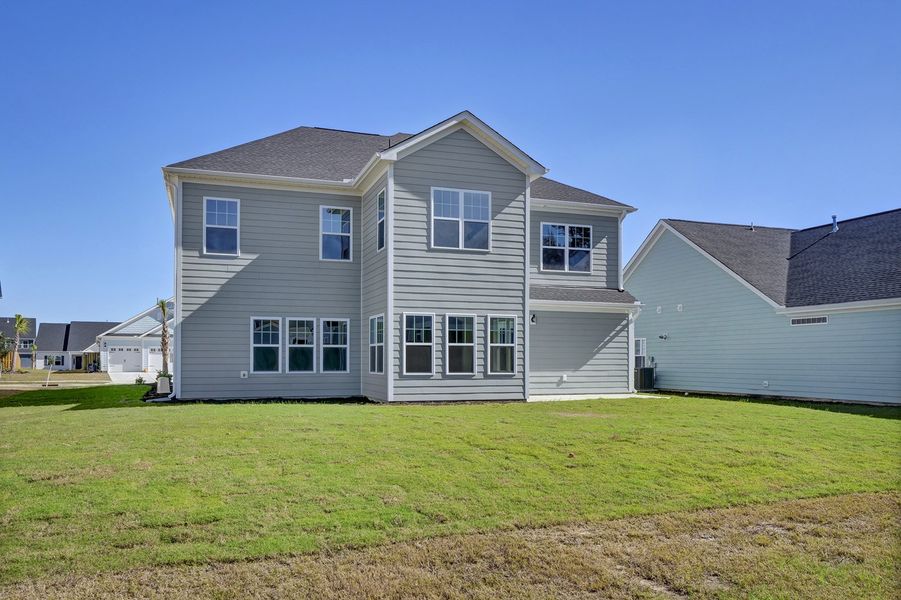 Exterior details and patio area of a home in Grand Park, Leland (Image 18).