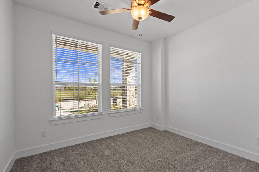 Spacious, unfurnished interior of a new home in Meridiana, Iowa Colony (Image 10).