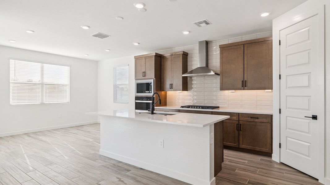 Representative furnished interior of a home built from the Crow by D.R. Horton in The Ridge at Stone Butte, Phoenix (Image 6).