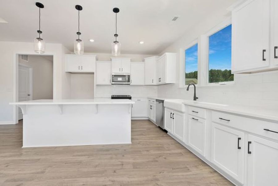 Representative furnished interior of a home built from the Shaw by True Homes in Whispering Hills, Locust (Image 6).