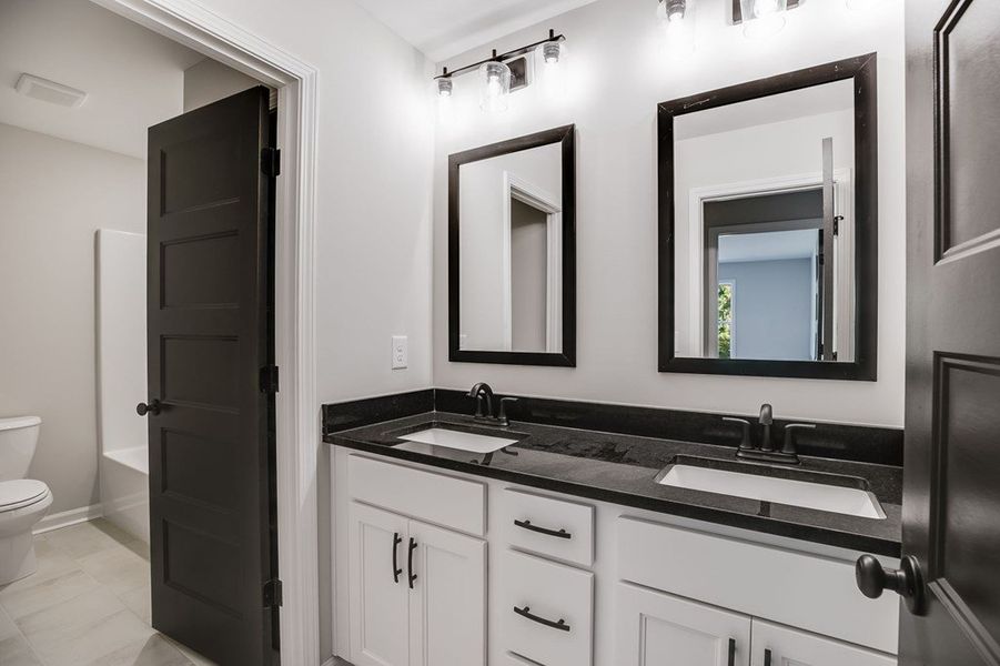 Furnished interior view inside a new home in LOVVORN ESTATES, Carrollton (Image 33).