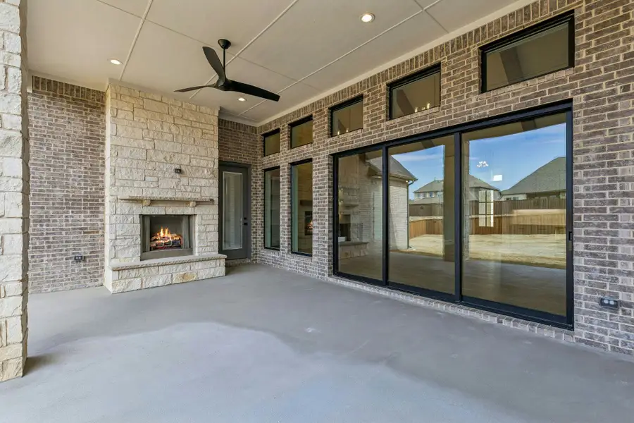 Exterior details and patio area of a home in The Vines, Haslet (Image 3).
