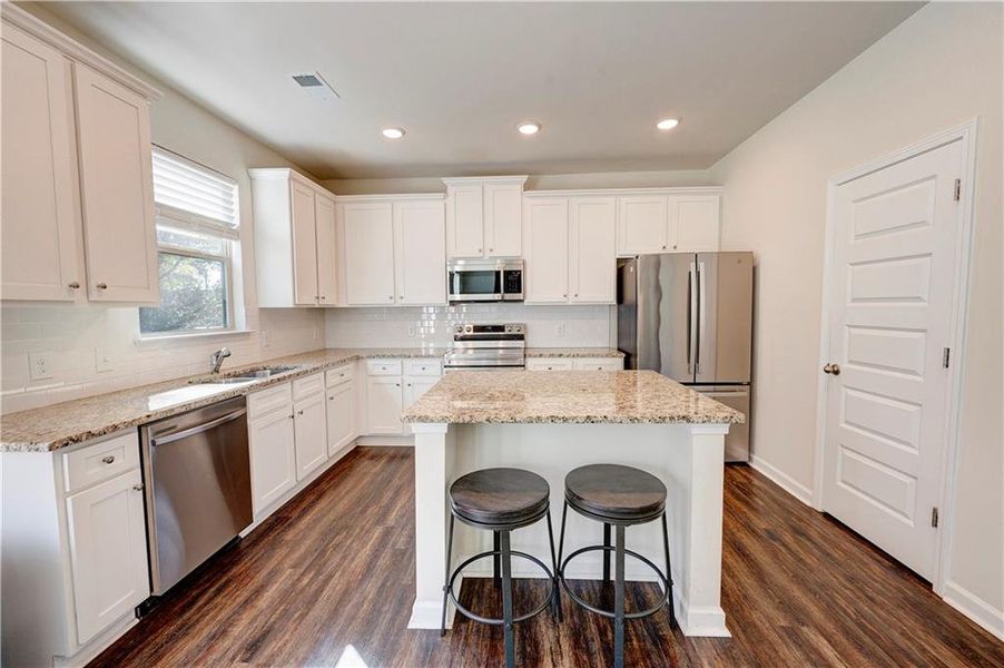 Furnished interior view inside a new home in , Calhoun (Image 11).