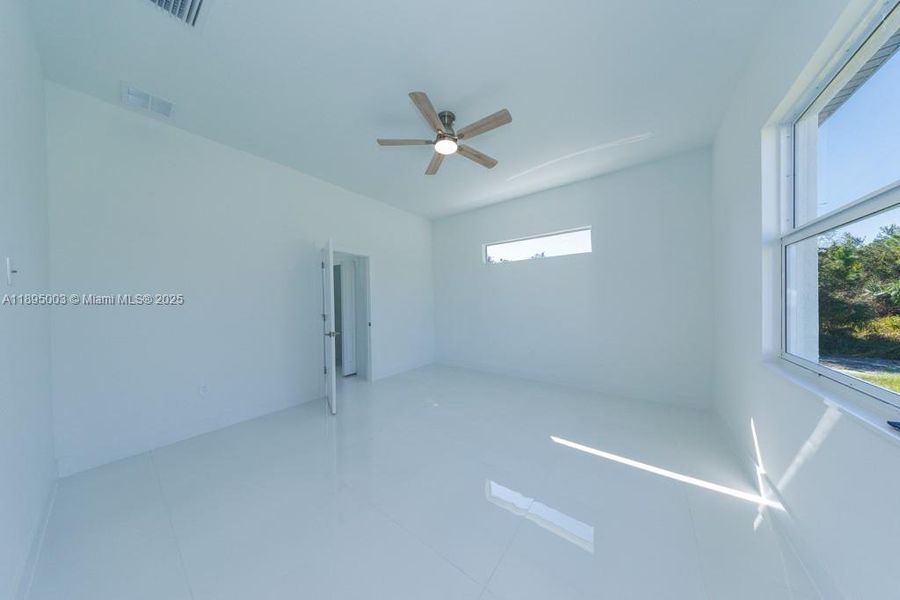 Spacious, unfurnished interior of a new home in , Lehigh Acres (Image 48).