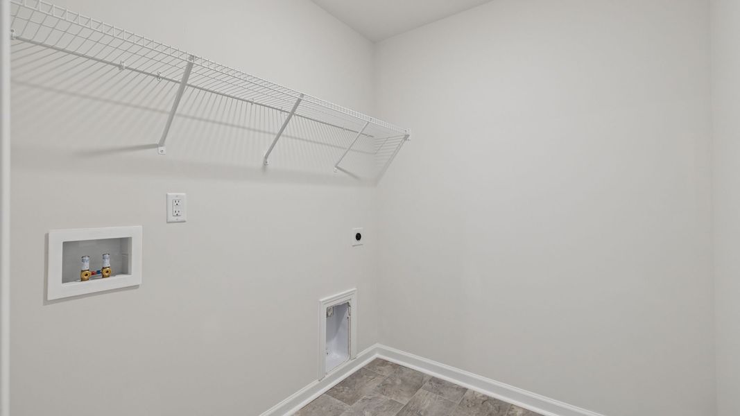 Spacious, unfurnished interior of a new home in Durbin Meadows Traditions, Fountain Inn (Image 29).