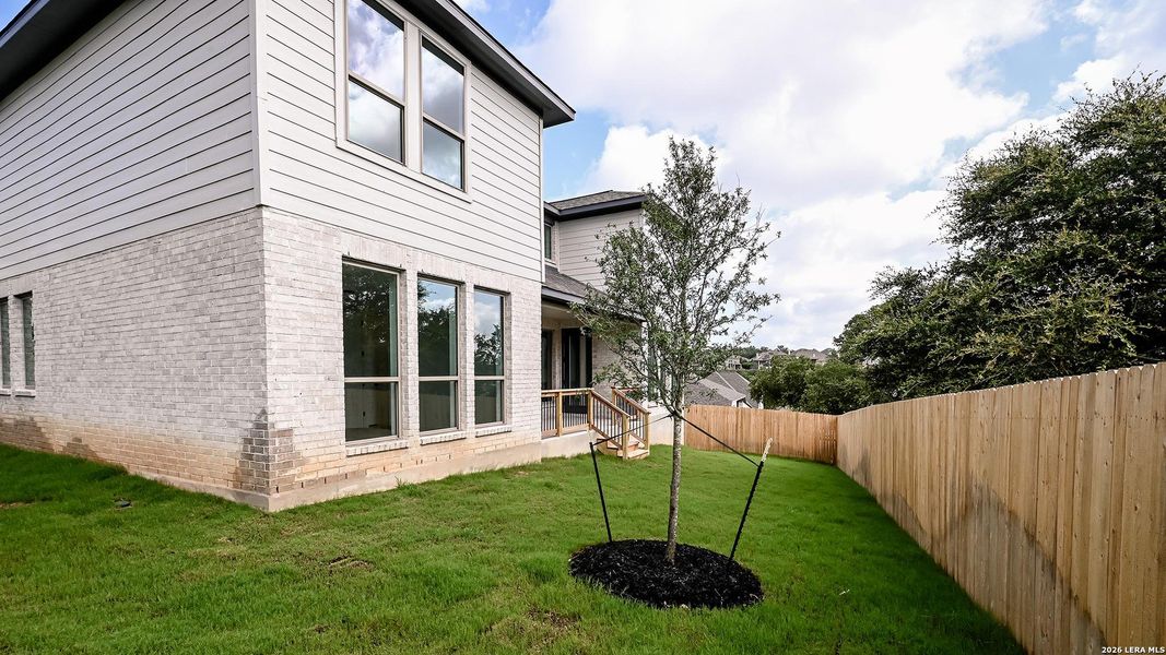 Exterior details and patio area of a home in Johnson Ranch, Bulverde (Image 17).