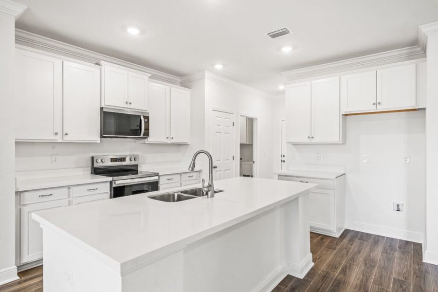 Furnished interior view inside a new home in Natureview, Freeport (Image 8).