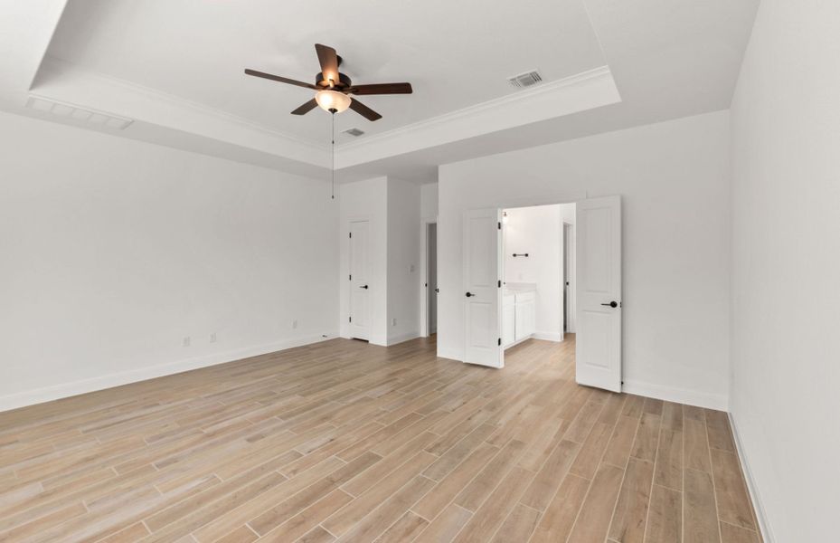 Representative unfurnished interior of a home built from the Wallace by Pulte Homes in Bluffview Reserve, Leander (Image 19).