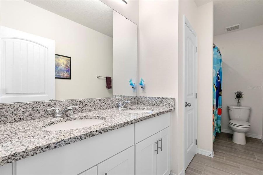 Furnished interior view inside a new home in Waterleigh, Winter Garden (Image 16).