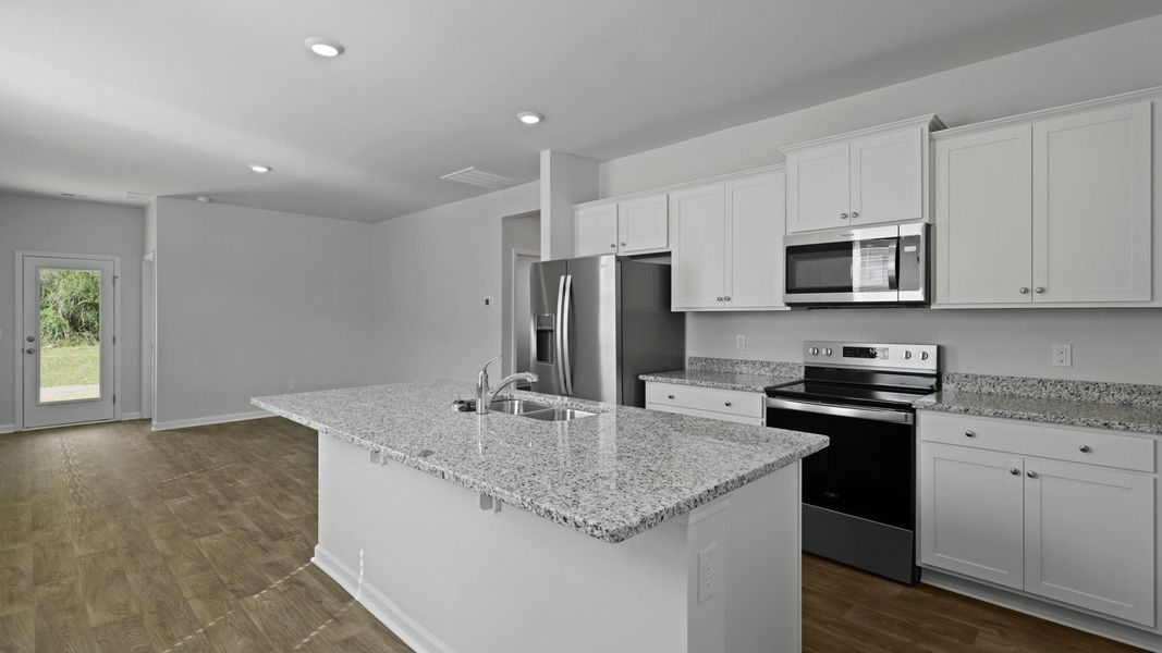 Representative furnished interior of a home built from the DOWNING by D.R. Horton in The Oaks at Center Station, Hollywood (Image 4).