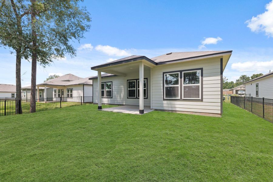 Front exterior of a new home in Lakes at Crockett Martin, Conroe, TX, highlighting curb appeal (Image 16).