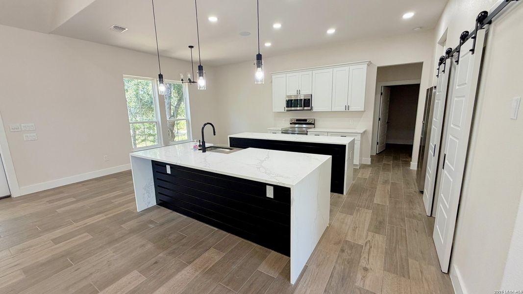 Furnished interior view inside a new home in , Bulverde (Image 8).