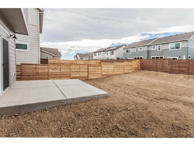 Exterior details and patio area of a home in Wilson Commons, Loveland (Image 27).