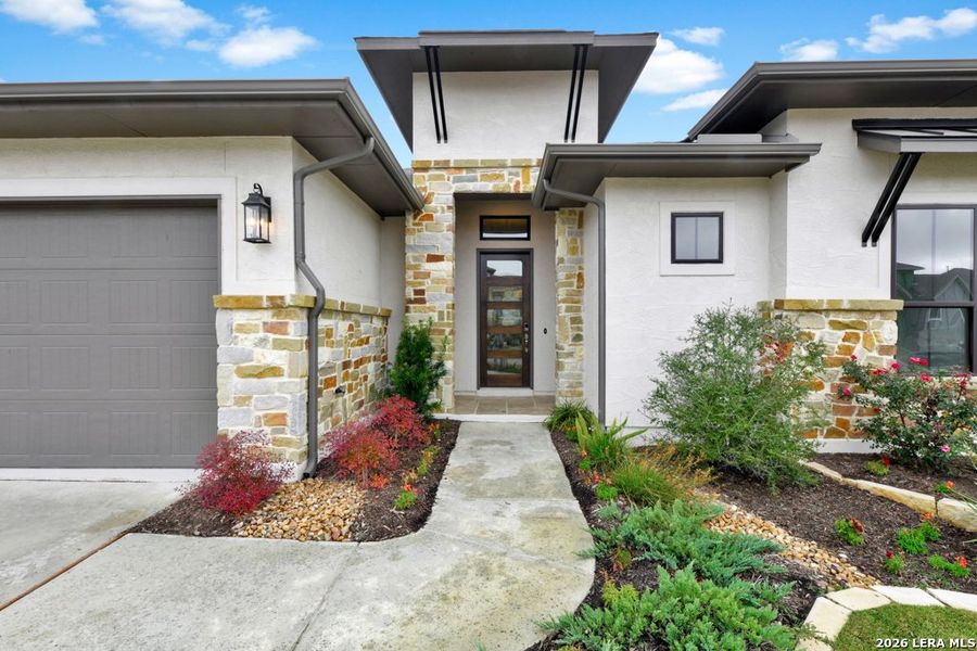 Exterior details and patio area of a home in El Sonido at Campanas, San Antonio (Image 4).