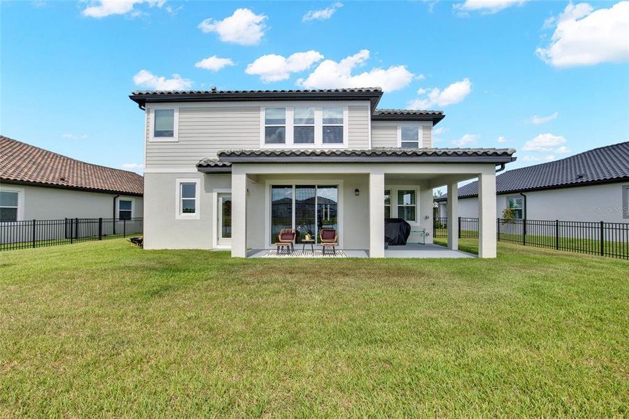 Exterior details and patio area of a home in , Wesley Chapel (Image 30).
