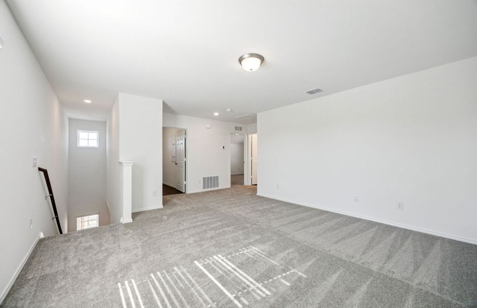 Representative unfurnished interior of a home built from the Monroe by Centex in Ashford Crossing, Princeton (Image 20).