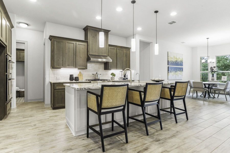 Gourmet kitchen in Ashlyn home at Belle Oaks, Bulverde TX