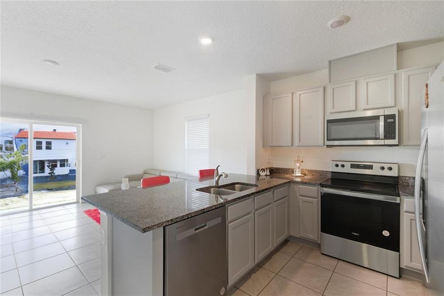 Furnished interior view inside a new home in Brentwood, Davenport (Image 7).
