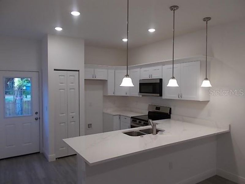 Furnished interior view inside a new home in , Daytona Beach (Image 7).