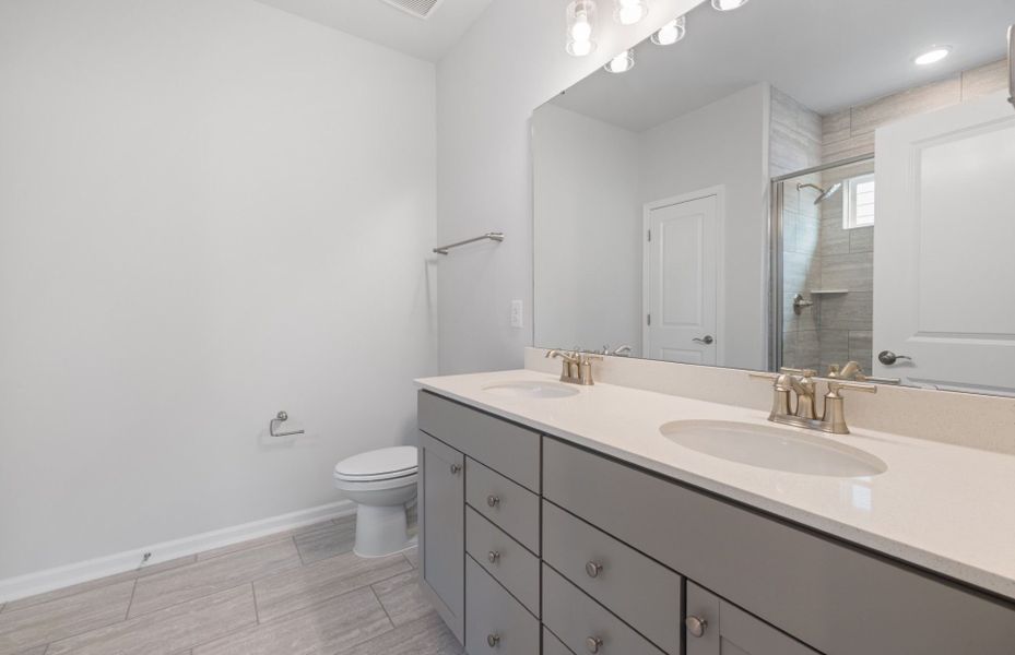Furnished interior view inside a new home in Exchange at 401, Raleigh (Image 6).