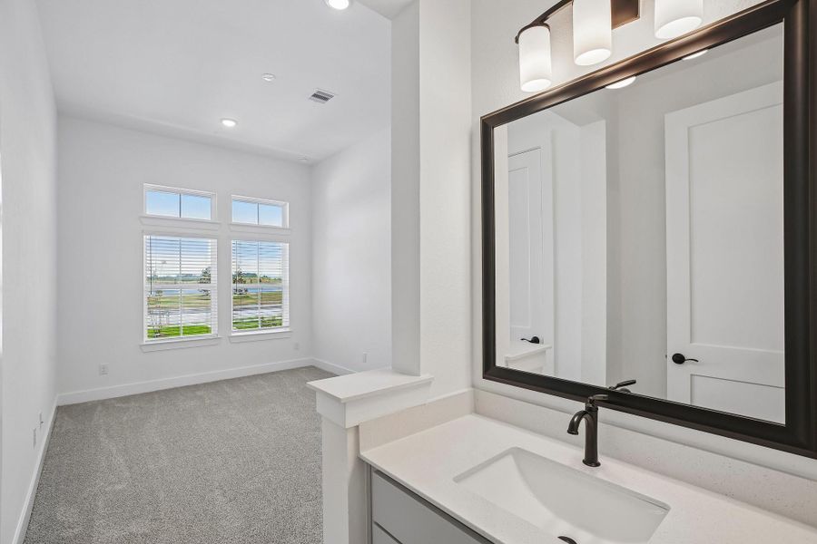 Furnished interior view inside a new home in Riceland 60',65',70', Old River-Winfree (Image 14).
