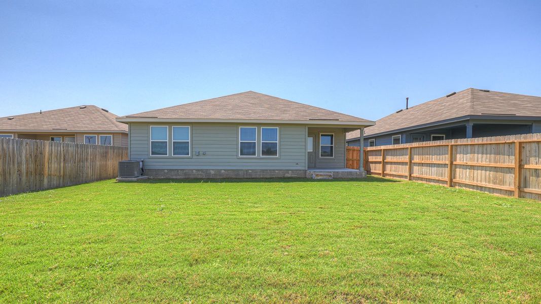 Front exterior of a new home in Navarro Fields, Seguin, TX, highlighting curb appeal (Image 21). Front exterior of a new home in Navarro Fields, Seguin, TX, highlighting curb appeal (Image 21).