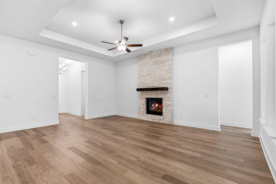 Family Room with tray ceiling & fireplace
