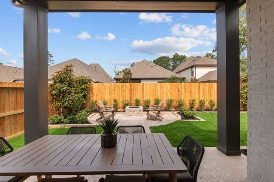 Exterior details and patio area of a home in The Highlands - Grove Collection, Porter (Image 4).