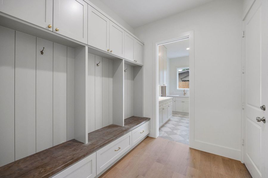 View of the substantial mud room, looking toward the scullery. View of the substantial mud room, looking toward the scullery.