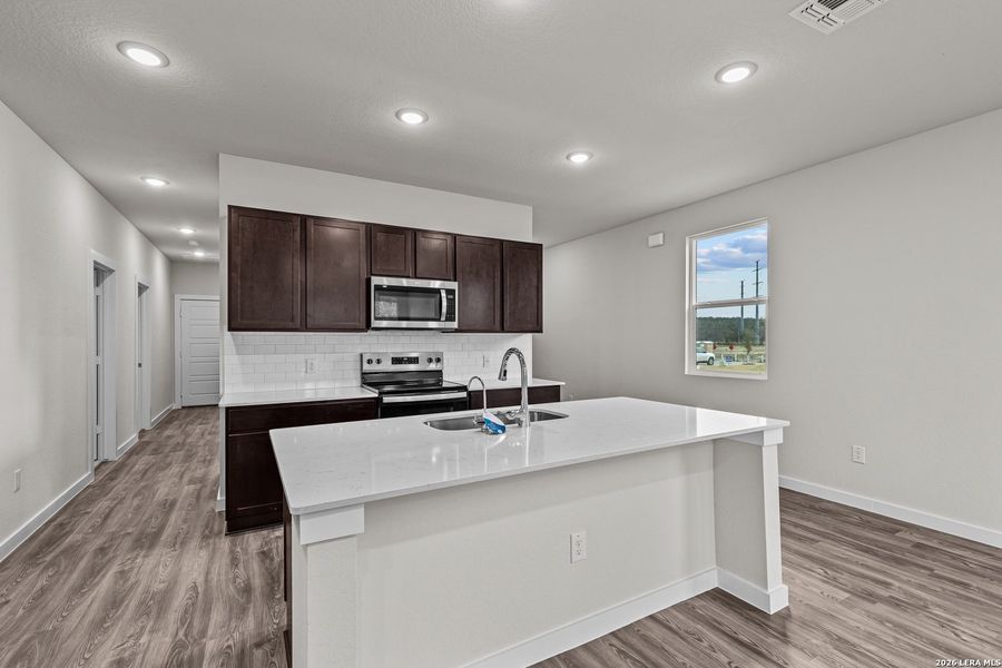 Furnished interior view inside a new home in Park Place, New Braunfels (Image 7).