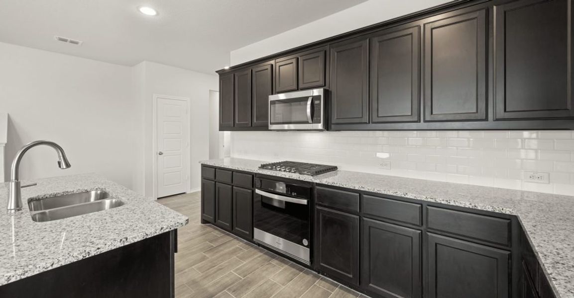 Representative exterior photo of a completed home built from the Brewer by Impression Homes in Redden Farms, Midlothian, TX (Image 9). Representative exterior photo of a completed home built from the Brewer by Impression Homes in Redden Farms, Midlothian, TX (Image 9).