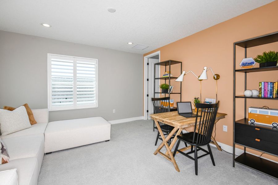 Furnished interior view inside a new home in Grand Park, Sarasota (Image 31).