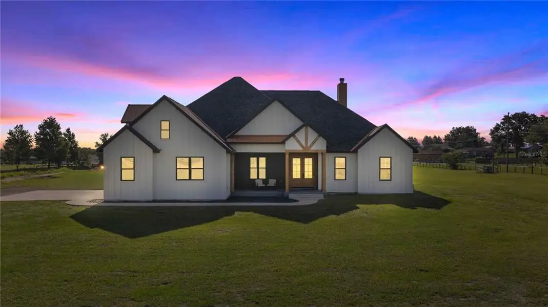Front exterior of a new home in , Belleview, FL, highlighting curb appeal (Image 29).