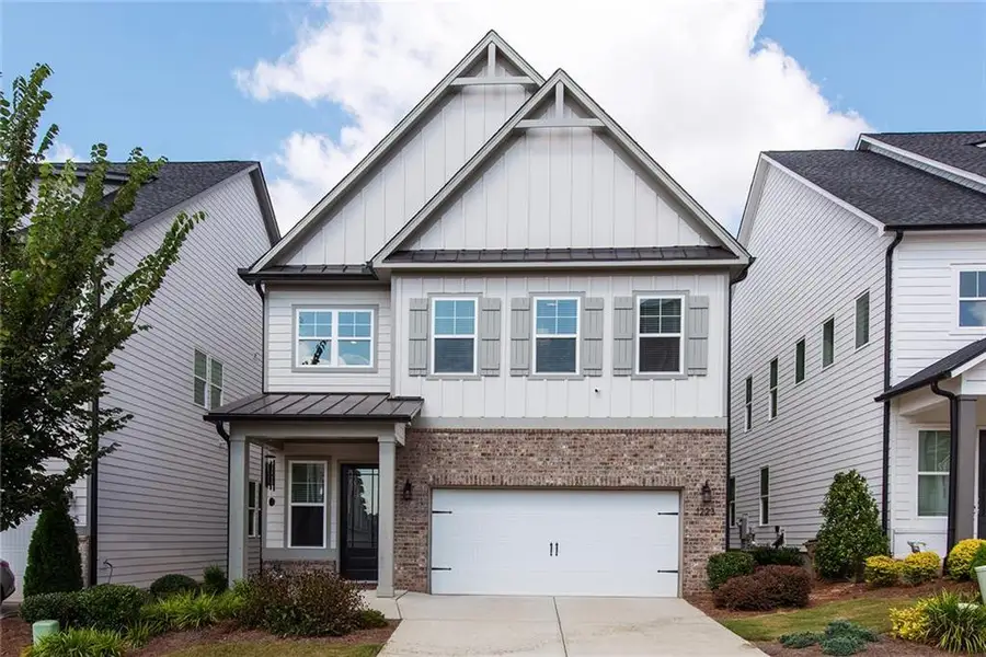Front exterior of a new home in , Cumming, GA, highlighting curb appeal (Image 23). Front exterior of a new home in , Cumming, GA, highlighting curb appeal (Image 23).