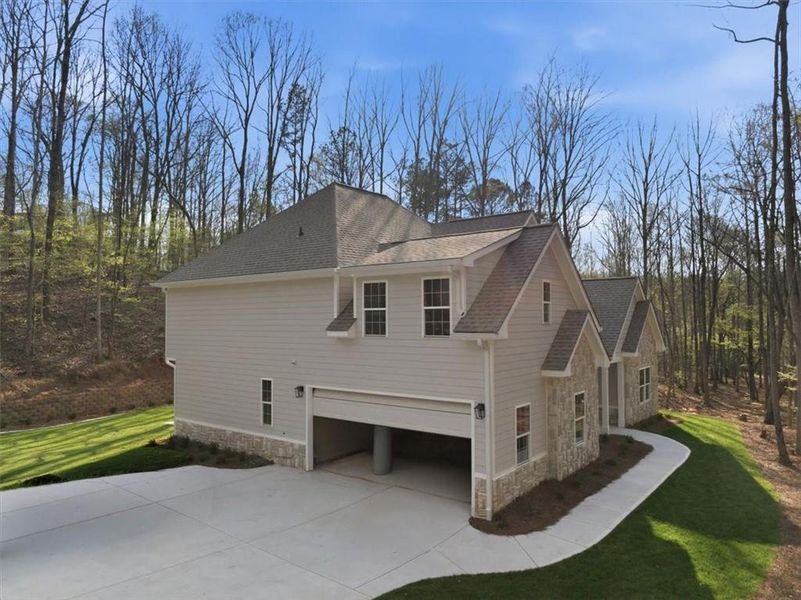 Front exterior of a new home in , Villa Rica, GA, highlighting curb appeal (Image 29). Front exterior of a new home in , Villa Rica, GA, highlighting curb appeal (Image 29).
