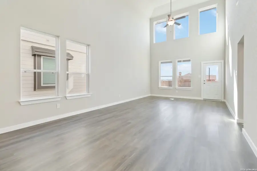 Spacious, unfurnished interior of a new home in Hunters Ranch, San Antonio (Image 14).