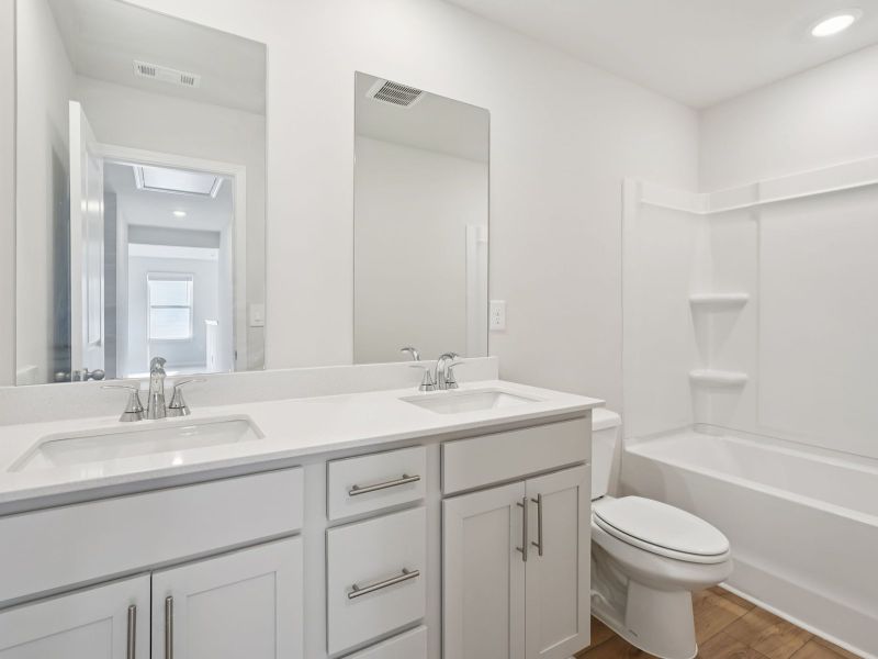 Furnished interior view inside a new home in Harmony Manor, Fairburn (Image 10).