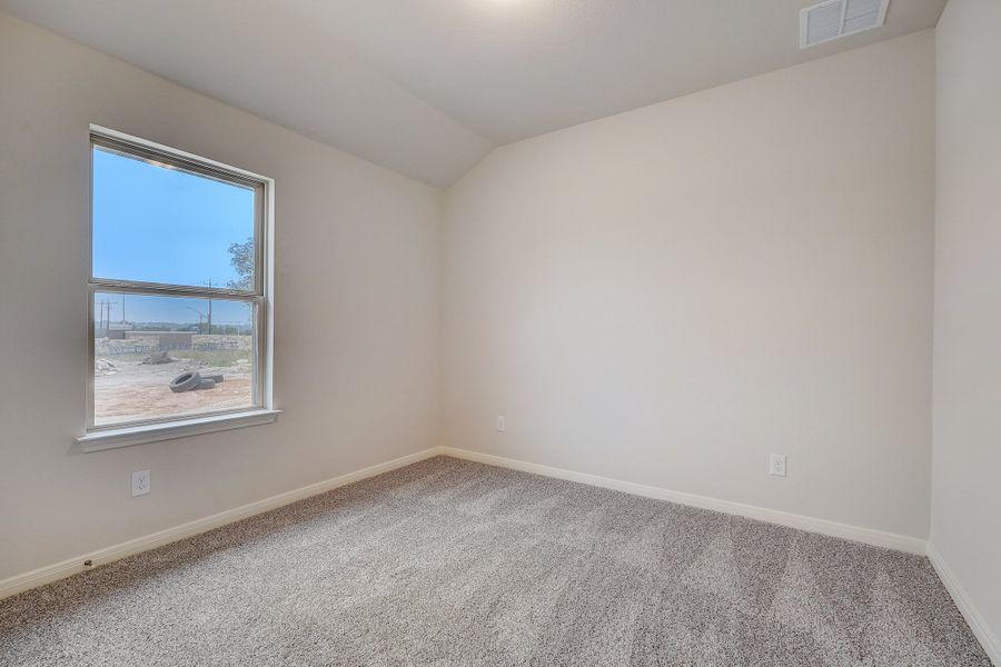 Guest room in the Oleander floorplan at a Meritage Homes community.