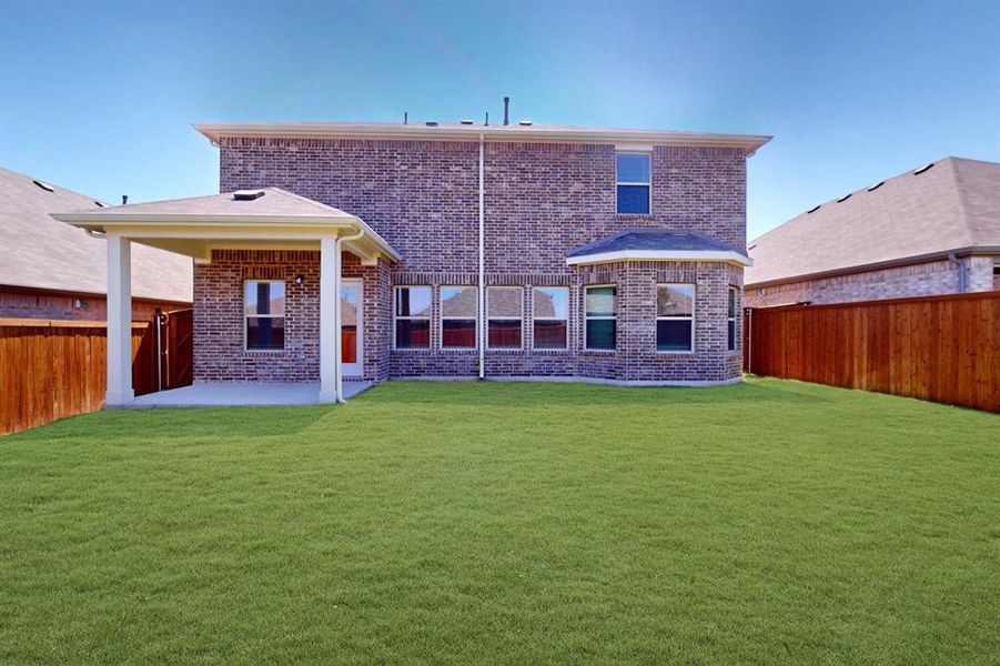 Front exterior of a new home in Sanderos, Fort Worth, TX, highlighting curb appeal (Image 2). Front exterior of a new home in Sanderos, Fort Worth, TX, highlighting curb appeal (Image 2).