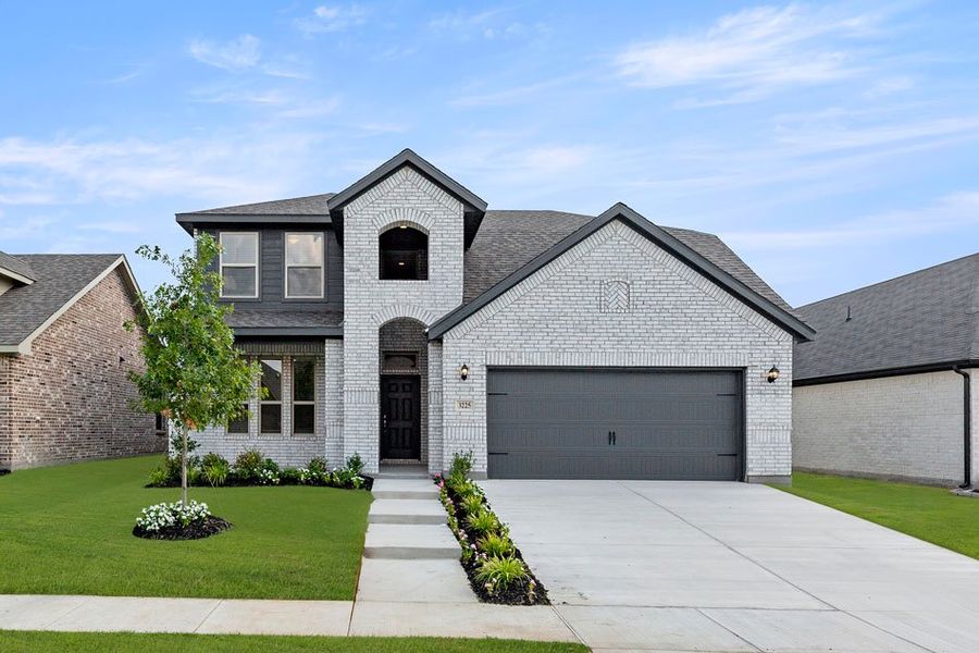 Representative exterior photo of a completed home built from the Raleigh by Impression Homes in Northspur, Terrell, TX (Image 1).