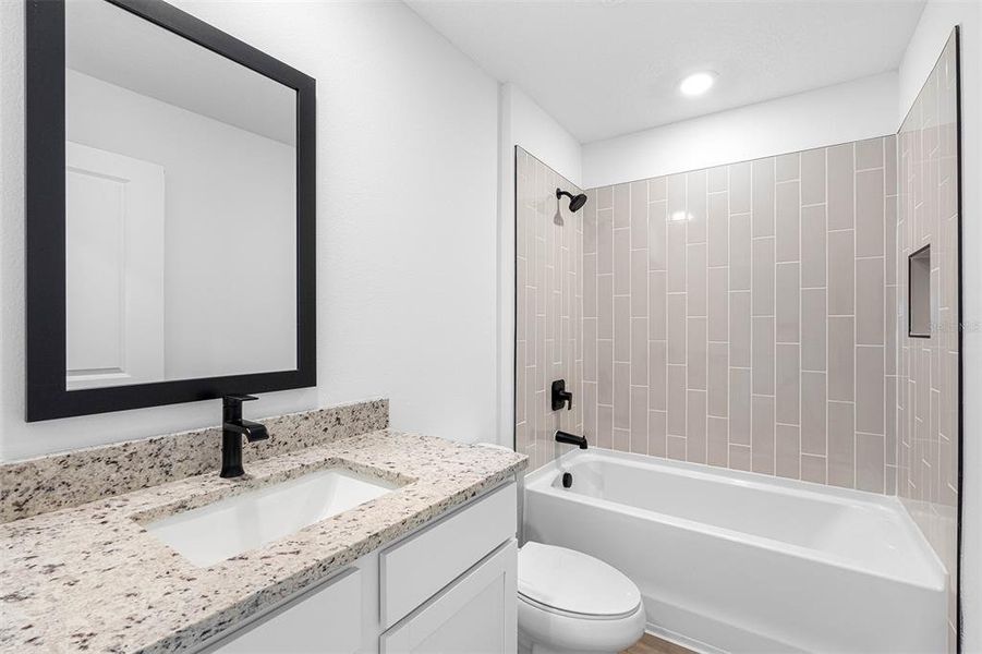 Furnished interior view inside a new home in Trilby Crossing, Brooksville (Image 2). Furnished interior view inside a new home in Trilby Crossing, Brooksville (Image 2).