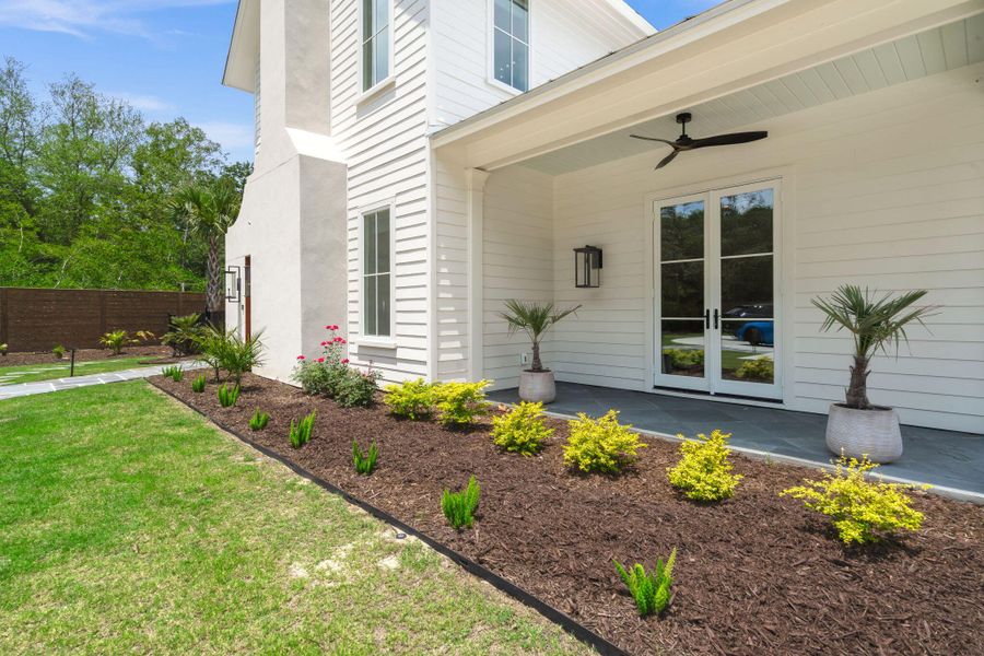 Exterior details and patio area of a home in , Johns Island (Image 3).
